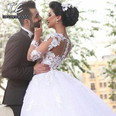 Scoop Ball Gown Wedding Dresses Illusion Back Long Sleeves Lace Appliques Floor Length Court Train Bridal Gown Dress 2019
