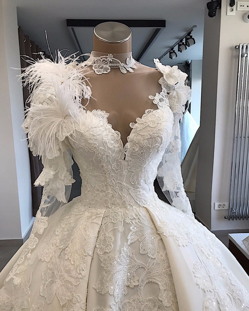 Vintage Satin Ball Gown Wedding Dress Long Sleeve with Feathers High Neck Lace Appliques Wedding Gowns Illusion Back Bride Dress