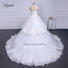 Liyuke Strapless Of  A-Line Wedding Dress With Tiered Skirt Of Court Train Wedding Gown