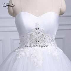 Liyuke Strapless Of  A-Line Wedding Dress With Tiered Skirt Of Court Train Wedding Gown
