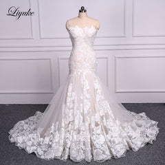 Liyuke Strapless Of  A-Line Wedding Dress With Tiered Skirt Of Court Train Wedding Gown