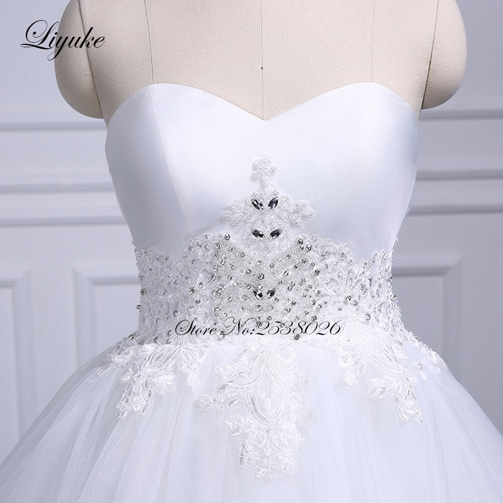 Liyuke Strapless Of  A-Line Wedding Dress With Tiered Skirt Of Court Train Wedding Gown