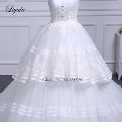 Liyuke Strapless Of  A-Line Wedding Dress With Tiered Skirt Of Court Train Wedding Gown