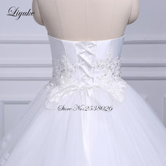 Liyuke Strapless Of  A-Line Wedding Dress With Tiered Skirt Of Court Train Wedding Gown