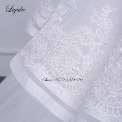 Liyuke Strapless Of  A-Line Wedding Dress With Tiered Skirt Of Court Train Wedding Gown