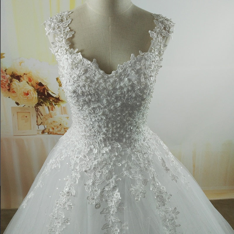 ZJ9076 Ball Gowns Spaghetti Straps White Ivory Tulle Wedding Dresses 2019 with Pearls Bridal Dress Marriage Customer Made Size