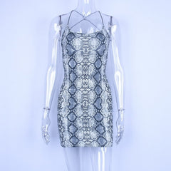 Hugcitar backless hollow out sexy bodycon dresses 2018 autumn women fashion club snakeskin print mini club dress