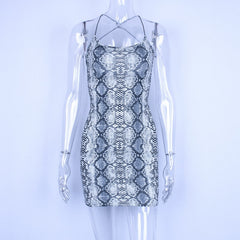 Hugcitar backless hollow out sexy bodycon dresses 2018 autumn women fashion club snakeskin print mini club dress